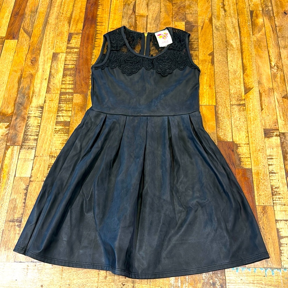 Katie dress, leather feel, but is made with polyester